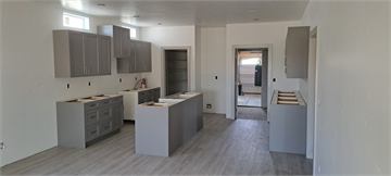 Gray custom kitchen cabinets installed by Jackson Cabinets
